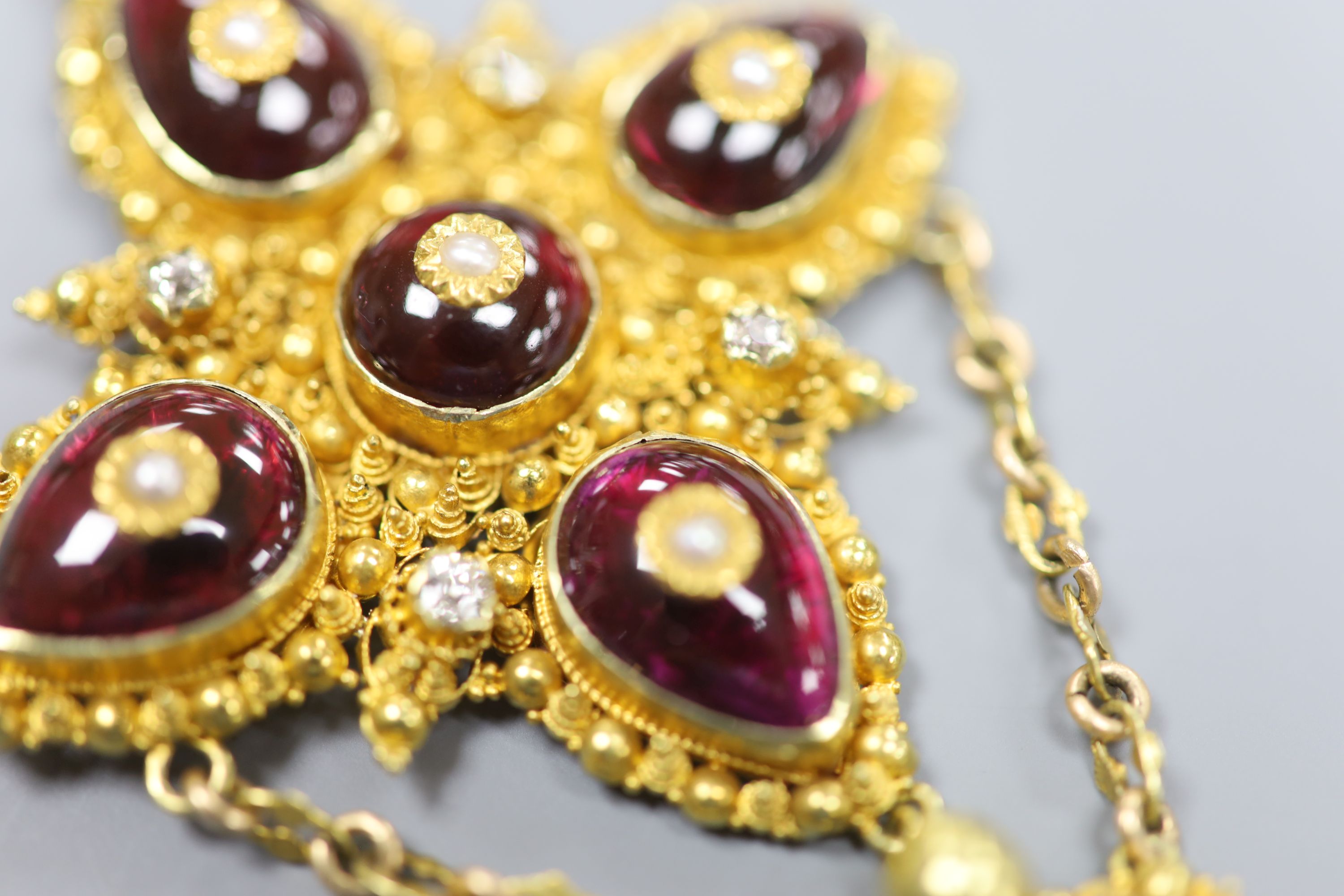A 19th century yellow metal, foil backed garnet, seed pearl and diamond set drop pendant (adapted)